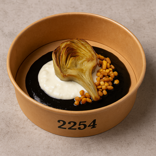 Corazón de Alcachofa a las Finas Hierbas con Cremoso de Parmigiano Reggiano (1 unidad)