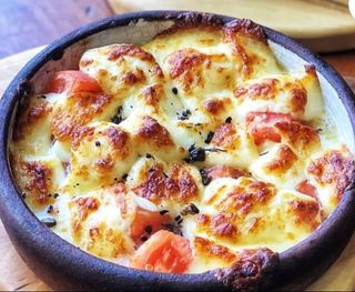 Курица тушенная с овощами в горшочке