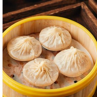 Ravioli di carne con brodo dí granchio