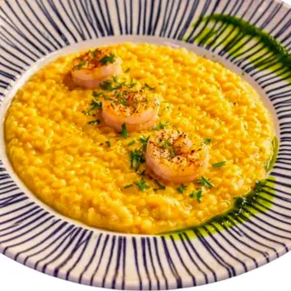 Risotto De Langostinos Y Chipirones