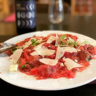 Carpaccio Di Manzo Con Rucola E Parmigiano