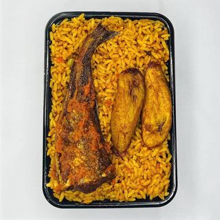 A Plate Of Rice With Fish