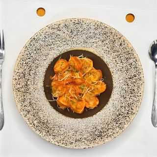 Пельмени в томатном соусе (200г)