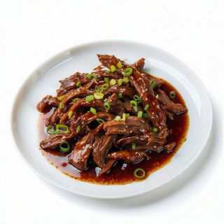 Tiras De Ternera En Salsa Picante