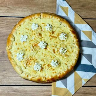 Пицца "Четыре сыра"