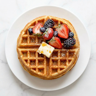 Waffles With Fruits And Syrup