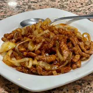 79. Ternera Con Cebolla