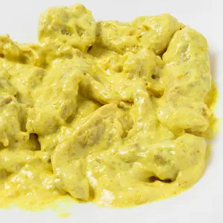 Pollo al Curry (300 G. Aprox.)
