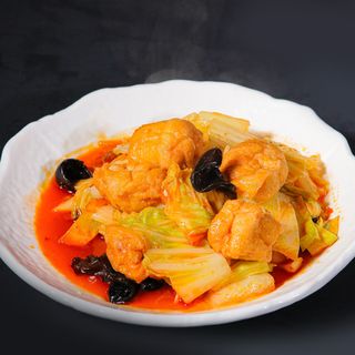 Tofu fritto saltati con cavolo e funghi cinesi