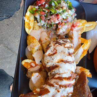 Pierna de pollo con tajadas