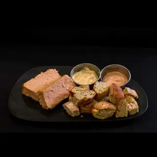 Pastel De Cabracho Con Sus Panecillos En Dos Salsas