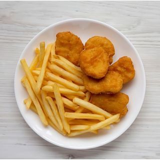 Nuggets Of Chicken And French Fries