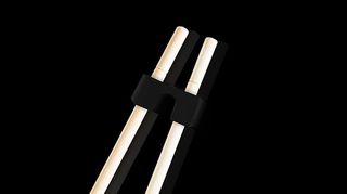 Фіксатор для навчальних паличок