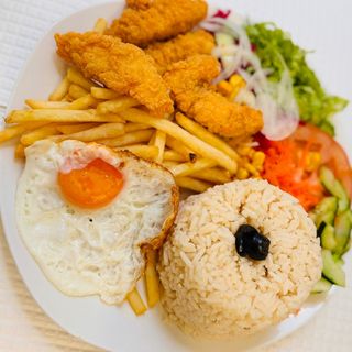 Frango panado no prato