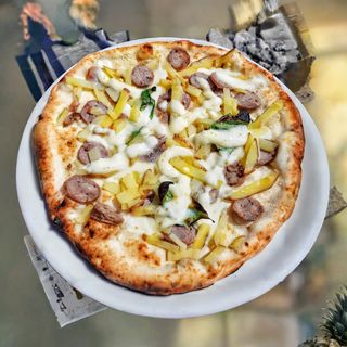 Patate al forno e salsiccia