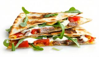 Piadina con arrostino, pomodoro, maionese e rucola