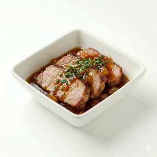 Presa Ibérica En Salsa De Sidra Con Manzana Y Miel