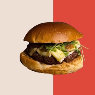 Hamburguesa Deliciosa con patatas fritas pequeñas