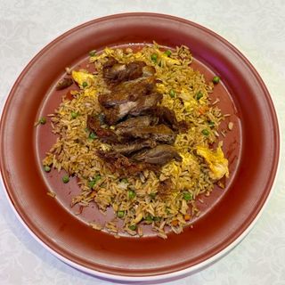 Arroz salteado con pato pekin