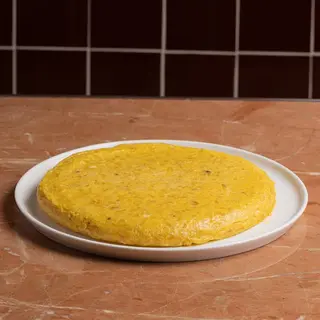 Tortilla Sin Cebolla mediana.