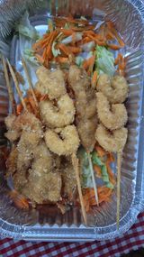 Brocheta de Langostinos con miel y mostaza