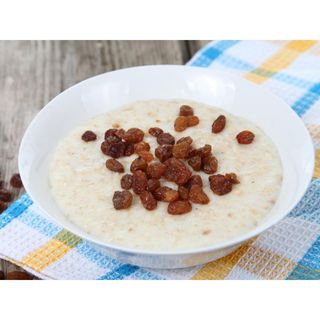 Hot Oatmeal Porridge with Almonds, Raisins & Brown Sugar