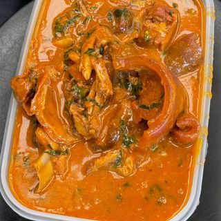 Assorted goatmeat, chicken mixed with ogbono