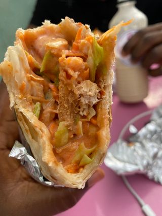 Large Chicken shawarma(veggies, two sausage with sauce and cream)