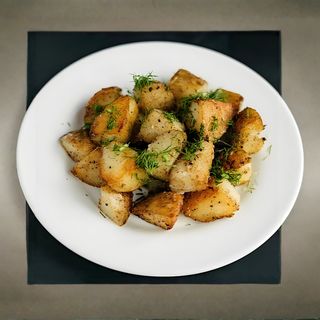 Смажена молода картопля з часником та зеленню (200г)