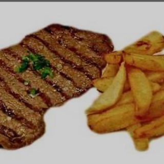 Bistec De Ternera Con Guarnición