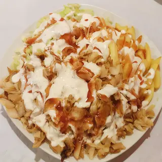 Plato De Pollo con arroz y patatas