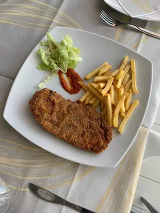 Cotoletta con patate fritte
