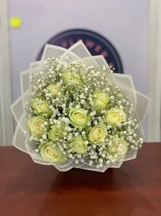 A Dozen White Roses & Babys Breathes