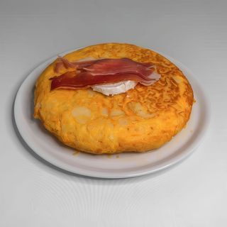 Tortilla De Patata Rellena De Jamón Y Queso