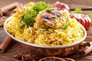 Chicken Dum Biryani + Raita + Boisson Au Choix