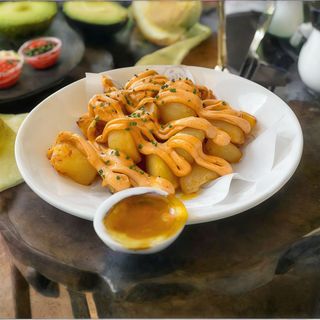 Bravas en Salsa deTrufas