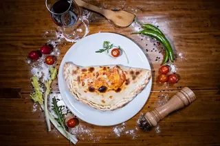 Calzonie Escalope + canette Gratuite 