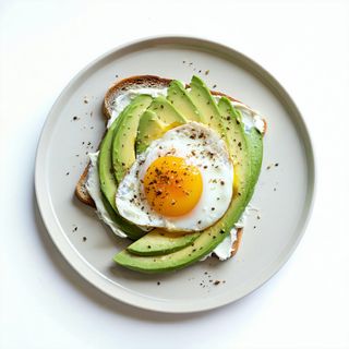 Tostadas con queso crema, aguacate y huevo (2 uds.)
