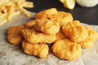 Nuggets de pui cu sos dulce acrisor