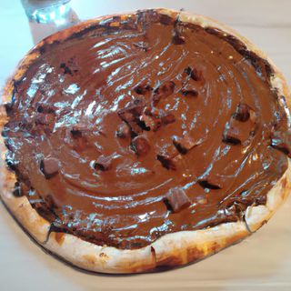 Pizza pequeña con chocolate/ nocciola