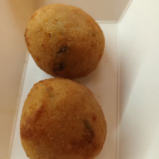 Arancini, patate, riso e cozze