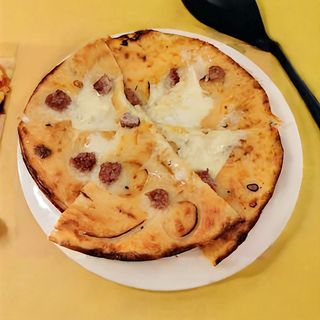 Farinata con gorgo e salsiccia