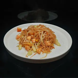 35c. Spaghetti di riso con frutti di mare