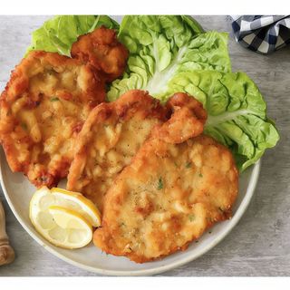 Lomo empanado, 2 huevos y papas