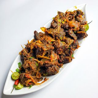 Whole Flame Roasted Goat