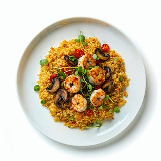 Langostinos salteados al tika-masala