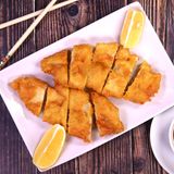 129. Панирано пилешко месо с лимон (500г)