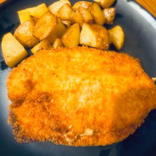 Escalopa de pollo relleno de jamon y queso 