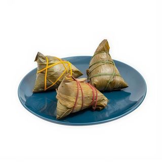 Zhong Zi Envuelto De Arroz Con Relleno De Carne De Cerdo y yema de huevos