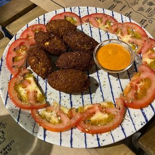 1/2 Ración de Falafel Con Tomates